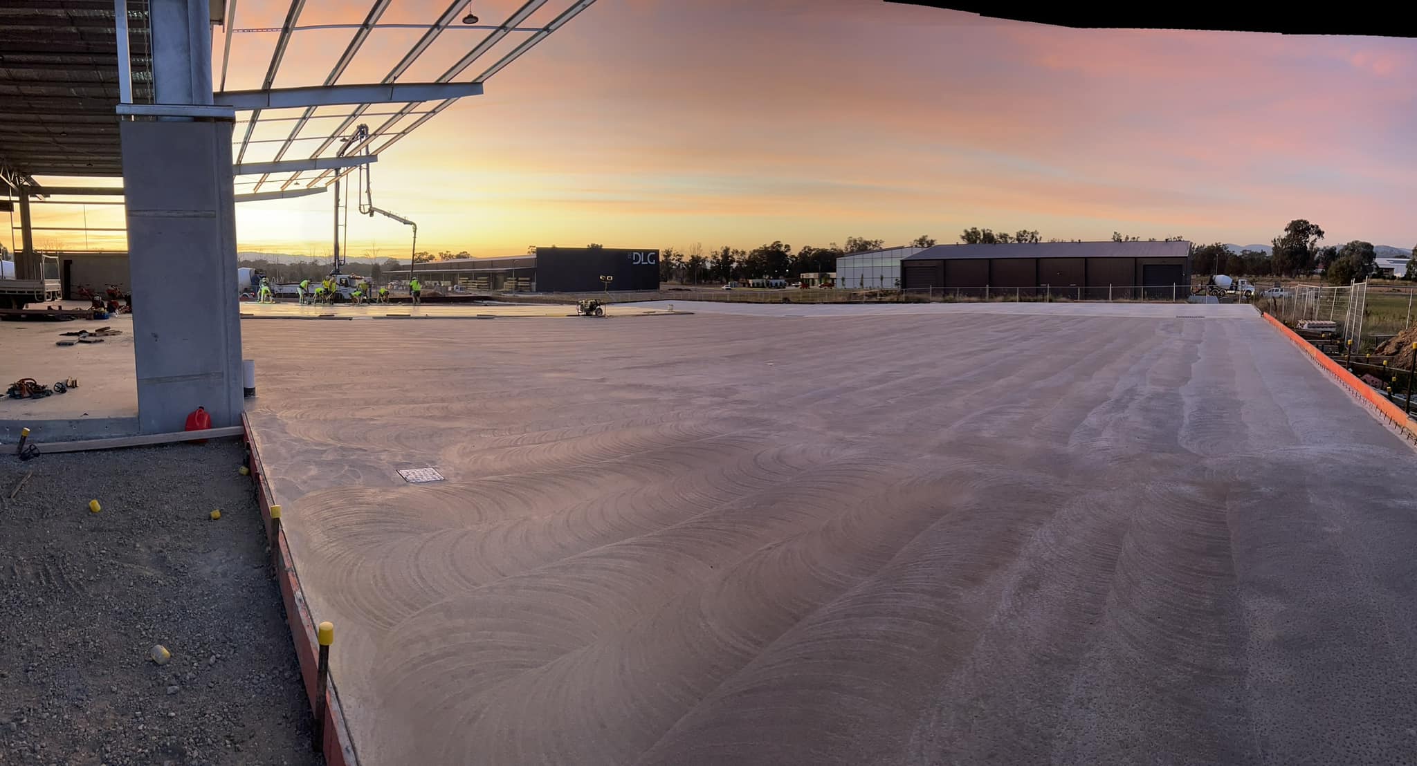 Large concrete pour at sunset